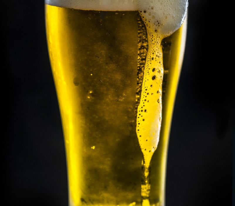 A glass of cold beer macro photography